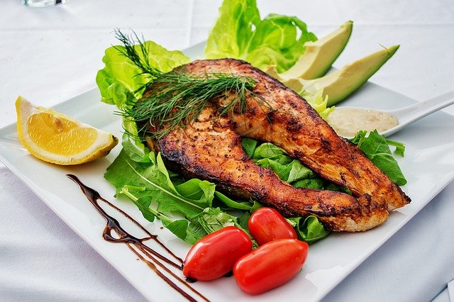 Grilled Salmon with avocado slices