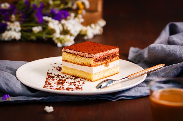 tiramisu dessert in white plate